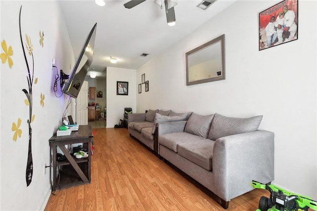 1209 Tallow Tree Ln, Harvey, LA 70058 - living room with ceiling fan, light wood-type flooring, and visible vents