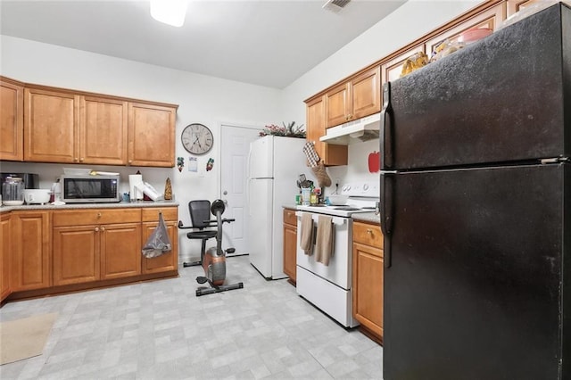 1209 Tallow Tree Ln, Harvey, LA 70058 - kitchen featuring under cabinet range hood, brown cabinets, and white appliances