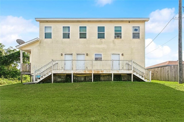 1209 Tallow Tree Ln, Harvey, LA 70058 - rear view of property featuring a wooden deck, stairs, and a yard