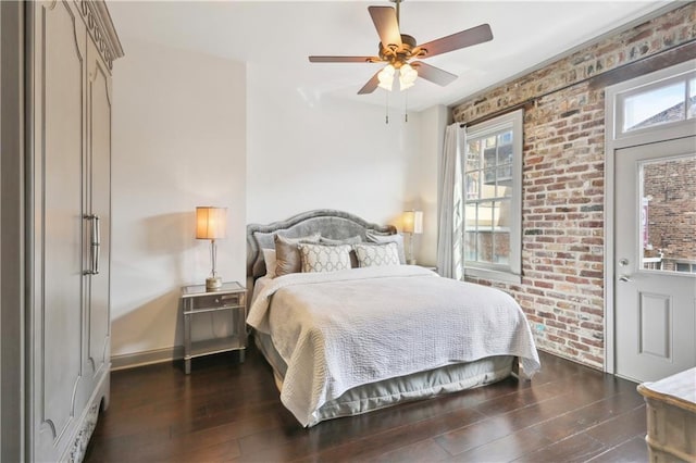 736 St Charles Ave Unit 2C, New Orleans, LA 70130 - bedroom with ceiling fan, dark wood finished floors, multiple windows, and baseboards