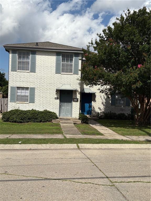 220002 Division St, Metairie, LA 70001 - traditional-style home featuring brick siding