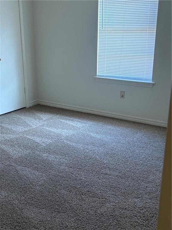 220002 Division St, Metairie, LA 70001 - spare room with carpet floors and baseboards