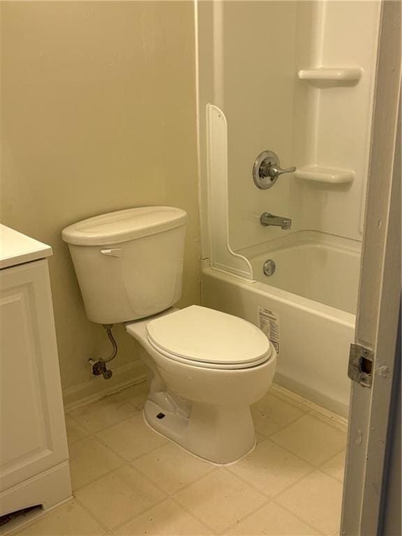 220002 Division St, Metairie, LA 70001 - bathroom with tile patterned flooring, vanity, toilet, shower / bath combination, and baseboards