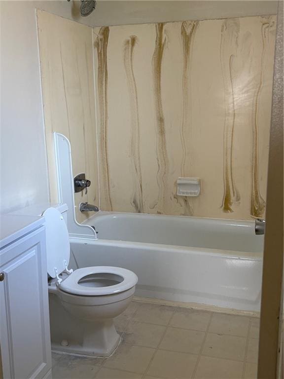 220002 Division St, Metairie, LA 70001 - bathroom featuring toilet, tile patterned floors, shower / bathing tub combination, and vanity