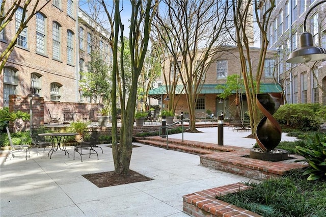 view of community with a patio area