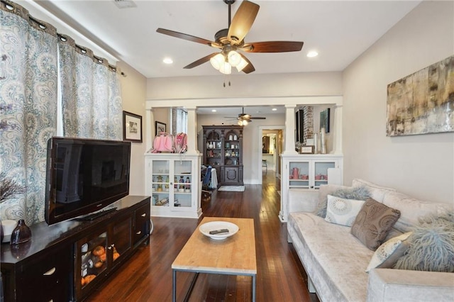 living area featuring a ceiling fan, recessed lighting, and wood finished floors