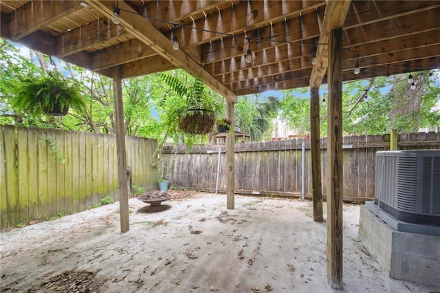 view of patio / terrace with a fenced backyard and central AC