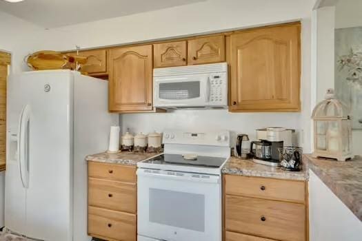 3320 Timberlane Way Dr Unit 134, Harvey, LA 70058 - kitchen with white appliances, light brown cabinetry, and light stone counters