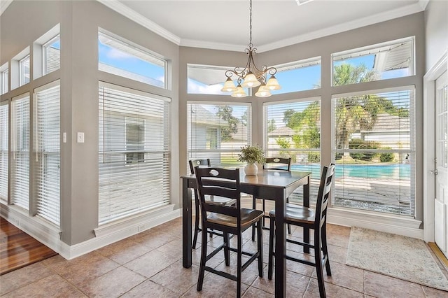 864 Sweet Bay Dr, Mandeville, LA 70448 - sunroom featuring a chandelier