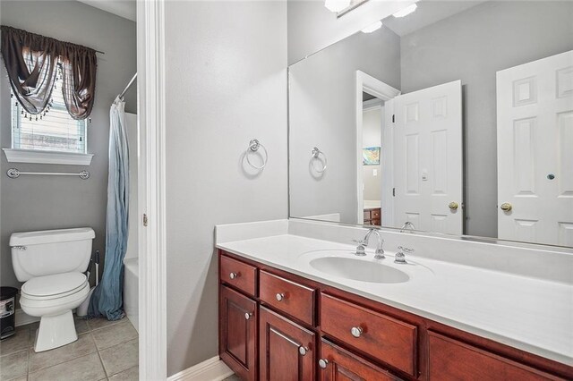 864 Sweet Bay Dr, Mandeville, LA 70448 - full bath with vanity, tile patterned floors, toilet, and shower / bath combo with shower curtain