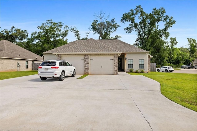 view of front facade featuring an attached garage, concrete driveway, stucco siding, and a front lawn