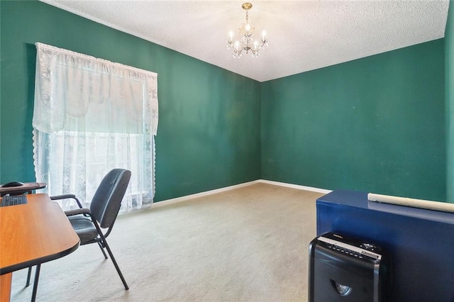 carpeted office space with a textured ceiling, baseboards, and an inviting chandelier