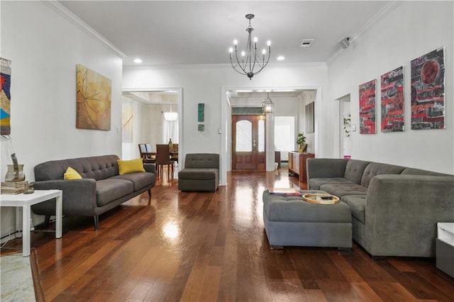 413 Dockside Dr, Slidell, LA 70461 - living room with ornamental molding, hardwood / wood-style flooring, visible vents, and a chandelier