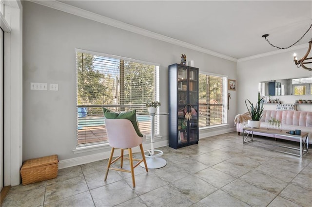 413 Dockside Dr, Slidell, LA 70461 - sitting room featuring crown molding, baseboards, an inviting chandelier, and a wealth of natural light