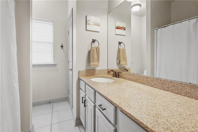 413 Dockside Dr, Slidell, LA 70461 - bathroom featuring tile patterned floors and vanity