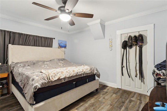 bedroom featuring a ceiling fan, baseboards, ornamental molding, and wood finished floors