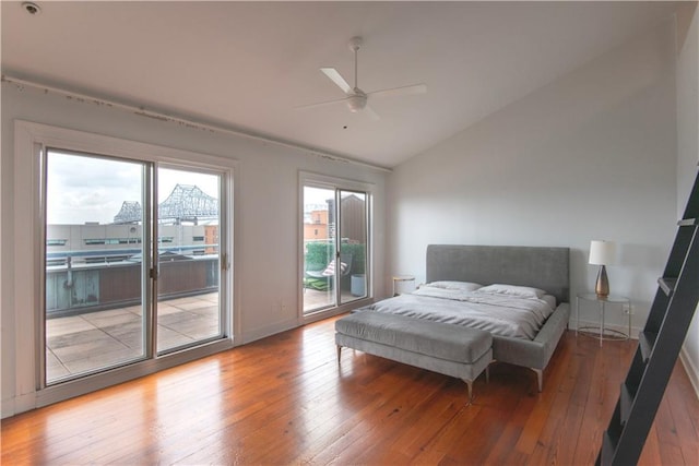 bedroom featuring a ceiling fan, vaulted ceiling, baseboards, light wood-style floors, and access to outside