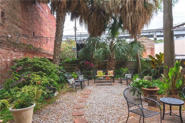 view of patio / terrace featuring fence