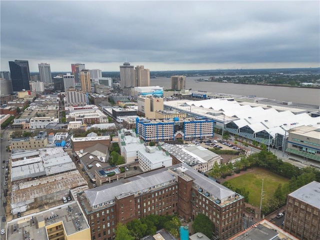 birds eye view of property with a view of city