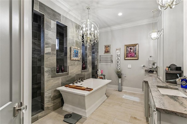 full bathroom with a sink, a soaking tub, a chandelier, and ornamental molding