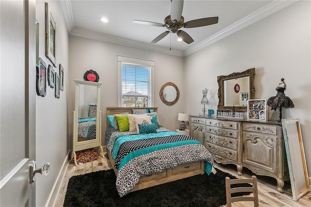 bedroom with ornamental molding, baseboards, ceiling fan, light wood-type flooring, and recessed lighting