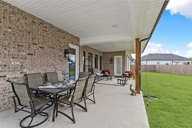 view of patio / terrace with outdoor dining area and a fenced backyard