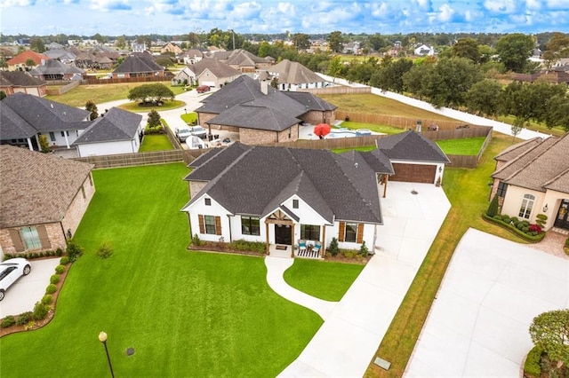 drone / aerial view with a residential view
