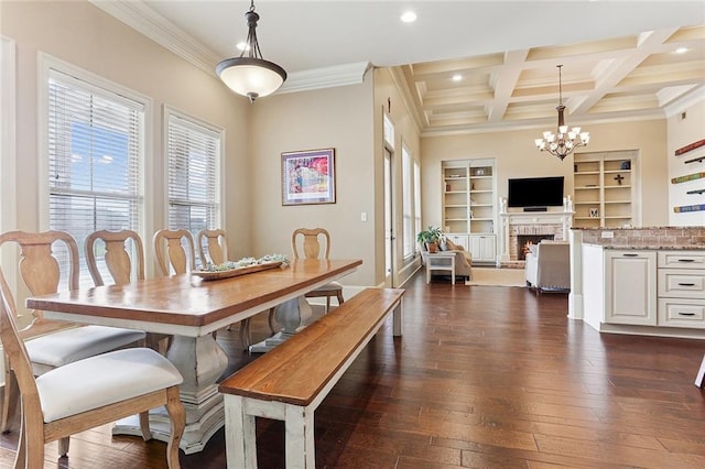 dining space featuring crown molding, beam ceiling, a notable chandelier, and a wealth of natural light