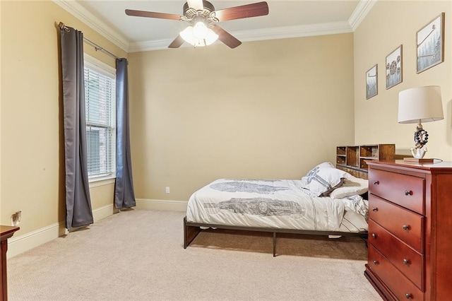 bedroom featuring crown molding, baseboards, light carpet, and ceiling fan