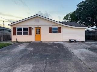 view of front of home with fence