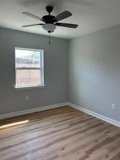 340 Azalea Dr, Waggaman, LA 70094 - unfurnished room featuring wood finished floors, baseboards, and a ceiling fan