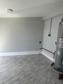 340 Azalea Dr, Waggaman, LA 70094 - basement with water heater, baseboards, and marble look tile flooring