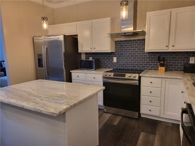 kitchen with ornamental molding, wall chimney range hood, dark wood-type flooring, white cabinetry, and appliances with stainless steel finishes