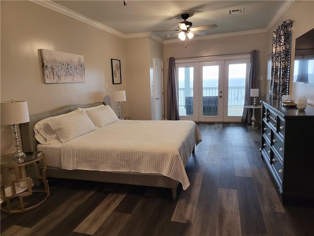 bedroom featuring french doors, visible vents, ornamental molding, access to outside, and dark wood-type flooring