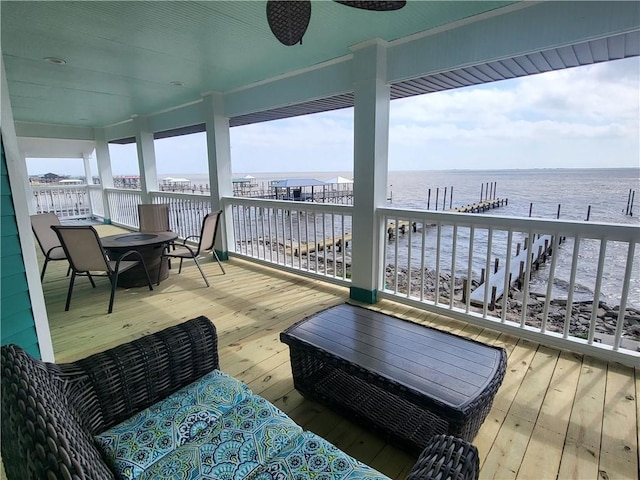 deck featuring a water view