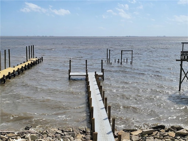 view of dock with a water view