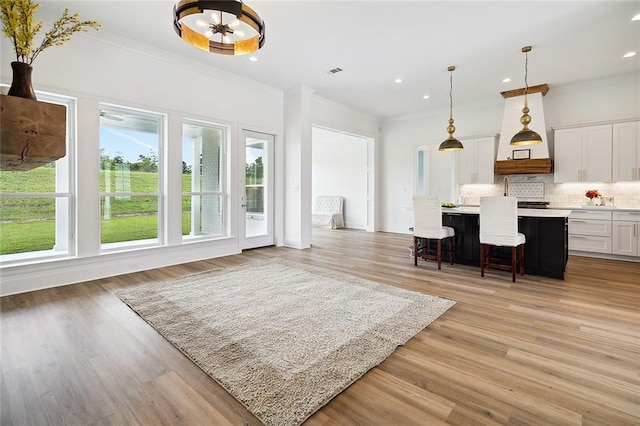 301 Cypress Lakes Dr, Slidell, LA 70458 - interior space with a healthy amount of sunlight, crown molding, light wood-style floors, and recessed lighting