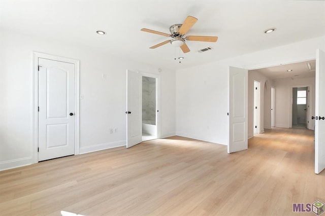 spare room featuring a ceiling fan, baseboards, recessed lighting, light wood-type flooring, and visible vents