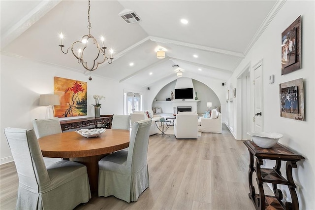 4524 Folse Dr, Metairie, LA 70006 - dining area featuring visible vents, recessed lighting, lofted ceiling with beams, light wood finished floors, and a notable chandelier