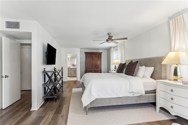 4524 Folse Dr, Metairie, LA 70006 - bedroom featuring ceiling fan, baseboards, wood finished floors, ensuite bathroom, and visible vents