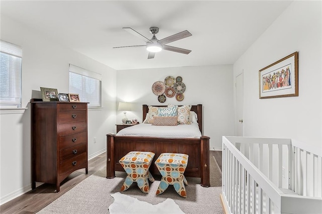 4524 Folse Dr, Metairie, LA 70006 - bedroom featuring baseboards, ceiling fan, and wood finished floors