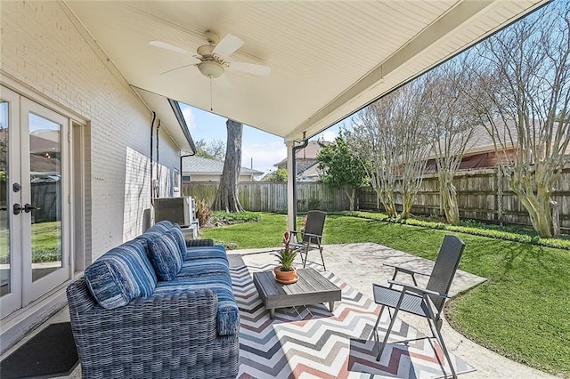 4524 Folse Dr, Metairie, LA 70006 - view of patio featuring central AC, an outdoor hangout area, a fenced backyard, french doors, and a ceiling fan