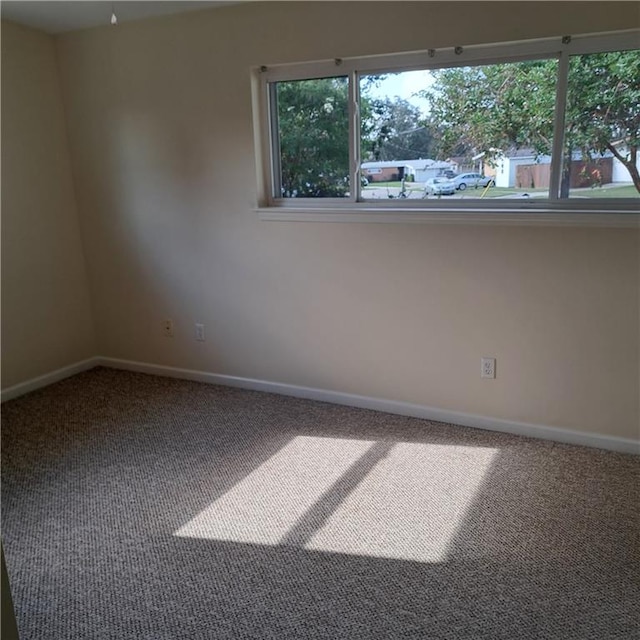 24 Caribou Ct, Metairie, LA 70003 - unfurnished room with carpet flooring and baseboards