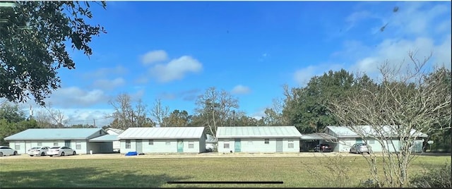 46344 Patti Ln, Hammond, LA 70403 - exterior space with metal roof and a front lawn