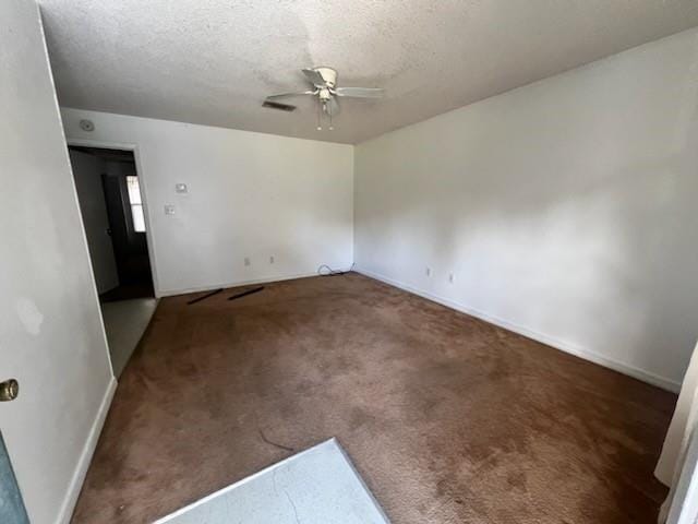 46344 Patti Ln, Hammond, LA 70403 - spare room with ceiling fan, a textured ceiling, visible vents, carpet floors, and baseboards