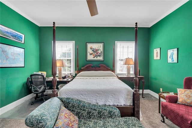bedroom with carpet floors, baseboards, crown molding, and multiple windows