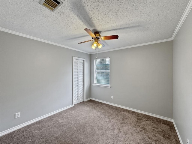 115 Spruce Cir, Slidell, LA 70458 - carpeted spare room featuring ceiling fan, a textured ceiling, and crown molding