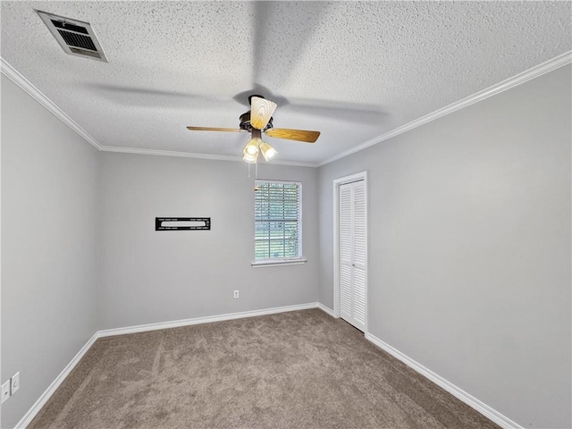 115 Spruce Cir, Slidell, LA 70458 - carpeted spare room with a ceiling fan, ornamental molding, and a textured ceiling