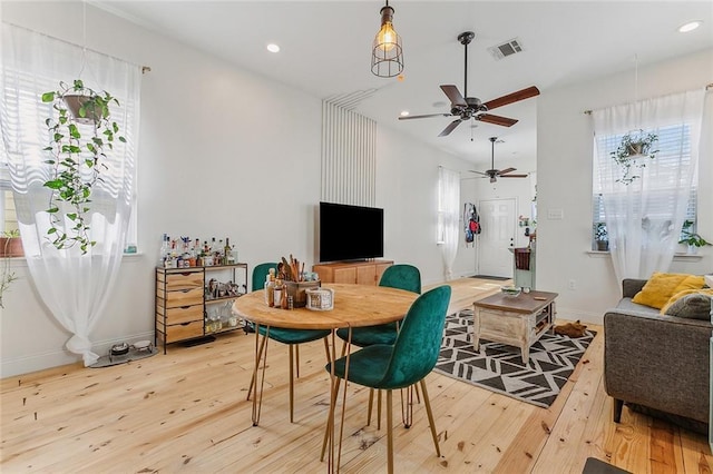 dining room with ceiling fan, light wood-style floors, recessed lighting, baseboards, and visible vents