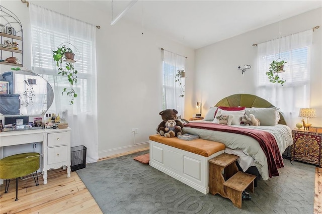 bedroom featuring light wood finished floors